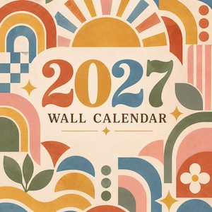 May include: A 2027 wall calendar featuring a graphic design with a sun, rainbows, and geometric shapes in muted tones of orange, blue, green, and pink. The text 2027 WALL CALENDAR is centered in a bold, serif font against a cream-colored background.