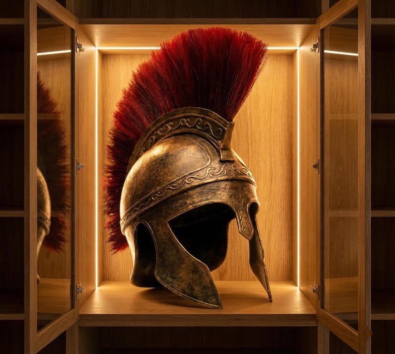 Odysseus Greek warrior helmet mounted gracefully on a wooden display stand on a bookshelf.