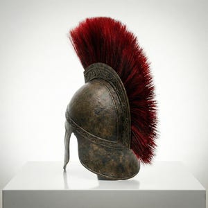 Side view of wearable ancient Greek Corinthian helmet forged in steel with red horsehair crest.