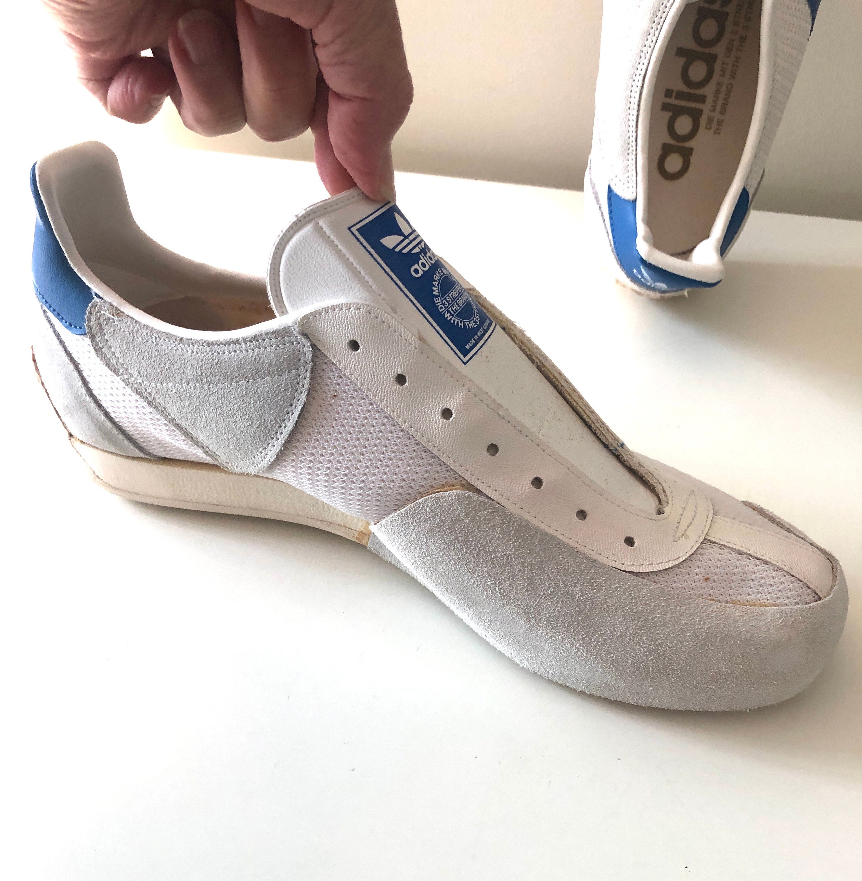 Adidas track shoes 1970 top