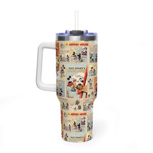 May include: A white-handled tumbler featuring a collage of vintage Mickey Mouse comic strips. The tumbler has a blue lid, a white straw, and the words "Mickey Mouse" are visible on the design. The tumbler is designed to keep drinks cold or hot.