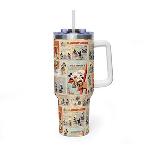 May include: A large tumbler featuring a comic strip design with images of Mickey Mouse. The tumbler has a white handle, a blue lid, and a white straw. The text "WALT DISNEY'S MICKEY MOUSE" is visible on the tumbler.