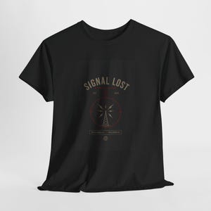 May include: Black t-shirt with a graphic design. The design features the words "SIGNAL LOST" above a red circle with a radio tower illustration. The text "EST. 2016" is above the circle, and "RECONNECT" is below.