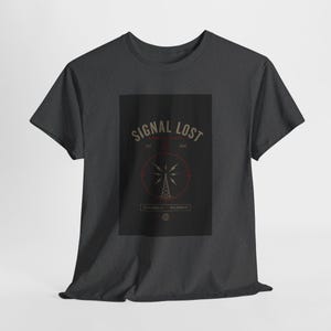 May include: Dark gray t-shirt featuring a graphic design with the text "SIGNAL LOST" in a vintage style. The design includes a radio tower and the words "DISCONNECT - RECONNECT".