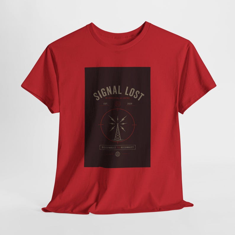 May include: A red t-shirt featuring a dark brown rectangular graphic. The graphic includes the text "SIGNAL LOST" above a stylized radio tower design. The text "DISCONNECT RECONNECT" is below the tower.