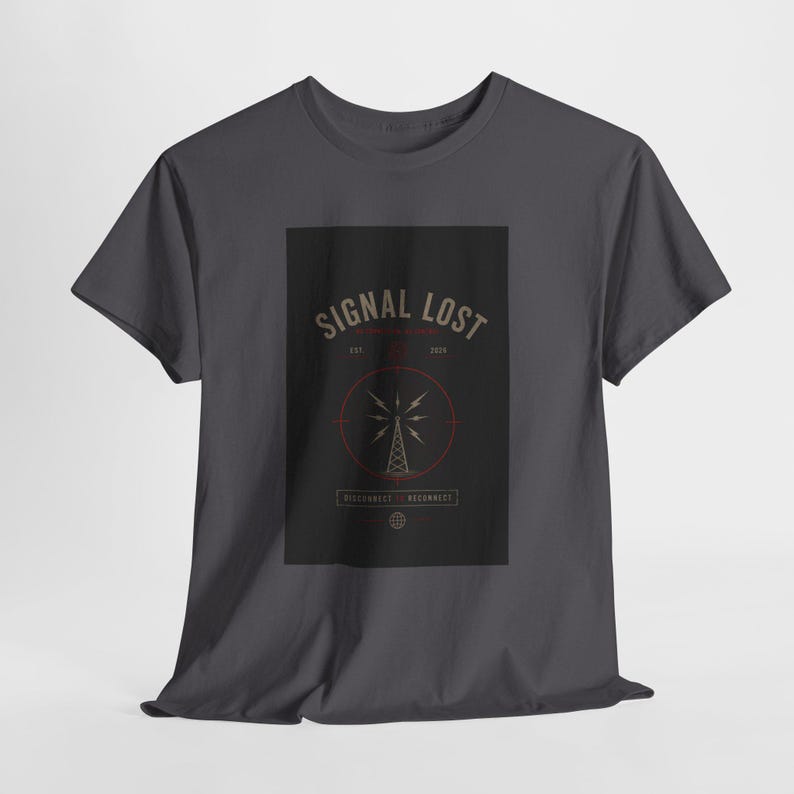 May include: Dark gray t-shirt featuring a rectangular graphic with the words "SIGNAL LOST" in a vintage font. The graphic includes a radio tower illustration within a red circle, with the text "DISCONNECT RECONNECT" below.