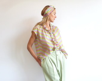 Sleeveless blouse in multi coloured striped taffeta fabric