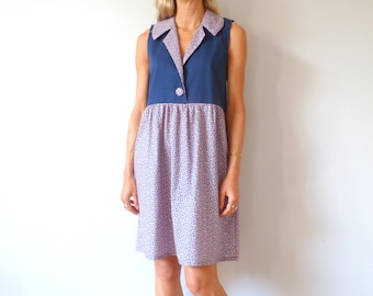 Sleeveless dress with large collar