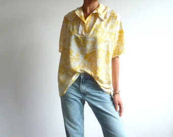 Loose yellow blouse with flowers and English embroidery finishes HILDA