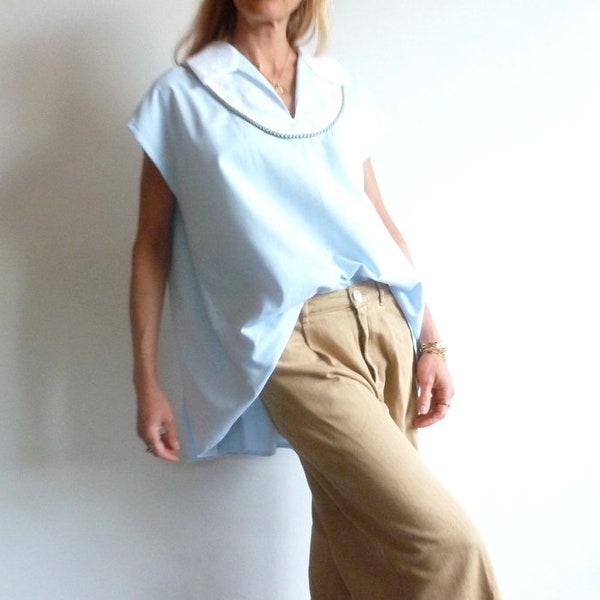 Loose blouse in sky blue cotton with English embroidery CLARISSE