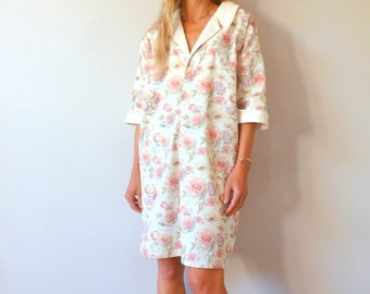 Loose dress in designer fabric printed with roses