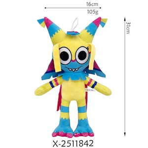 K&ouml;nnte beinhalten: Ein Pl&uuml;schtier in Form einer Zeichentrickfigur. Das Spielzeug ist gelb, blau und rosa, mit gro&szlig;en schwarzen Augen und einem grinsenden Mund. Es ist 31 cm hoch und 16 cm breit und wiegt 105 g. Der Produktcode X-2511842 ist unten aufgedruckt.