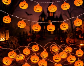 May include: A string of orange pumpkin-shaped LED lights featuring carved jack-o'-lantern faces. The small, glowing plastic pumpkins are evenly spaced along a thin, flexible wire, creating a festive illumination for seasonal decor.