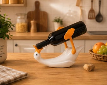 Cute duck-shaped wine bottle holder, kitchen counter wine display rack, modern gift for wine lovers, adorable duck-shaped wine rack.