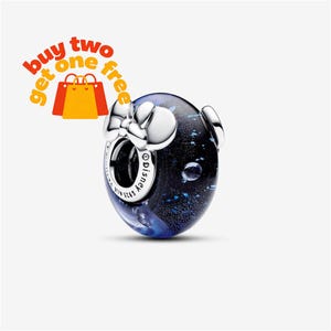 May include: A spherical charm bead featuring a dark blue, glittery glass surface with a silver metal core. The charm is adorned with a silver bow detail and includes the engraved text Disney S925 ALE on the inner metal ring.