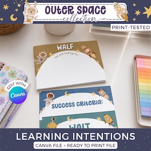 May include: A set of rectangular educational note cards featuring space-themed illustrations of astronauts and rockets. The cards include text headers such as WALF, We are looking for, and SUCCESS CRITERIA, with blank white areas for writing notes.