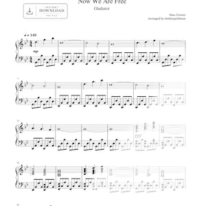 Peut inclure: Une partition numérique pour piano du morceau Now We Are Free du film Gladiator par Hans Zimmer, arrangée par Atelierpartitions. Le document présente une notation musicale noire sur fond blanc avec une icône de téléchargement.