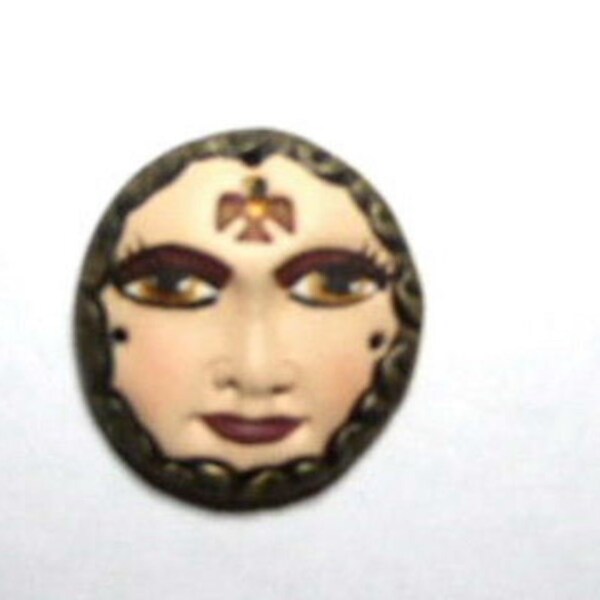 Thunderbird, face cab, clay face, cabochon, altered art, assemblage