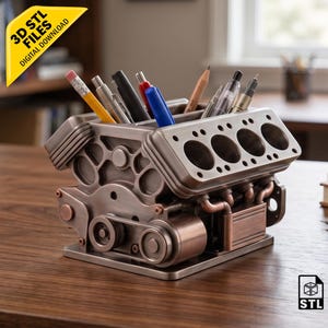 May include: A metallic engine block desk organizer with multiple cylindrical compartments for pens and pencils. The design features realistic engine components including pulleys, belts, and copper-colored accents. Text on the image reads 3D STL FILES DIGITAL DOWNLOAD.