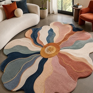 Peut inclure: Un grand tapis en forme de fleur aux couleurs vives. Le tapis présente un motif central circulaire dans les tons de jaune et de marron, entouré de sections en forme de pétales bleus, roses et beiges. Le design du tapis ajoute une touche artistique à tout espace de vie.