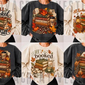 May include: A collection of six crewneck sweatshirts in cream and charcoal gray, each featuring a graphic print of stacked books, autumn leaves, pumpkins, and coffee mugs with the text All Booked for Fall, Crisp Air, Cozy Days, and Autumn Stories.