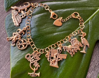 Pulsera de oro con dije de Nueva Orleans: joyería de Luisiana