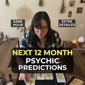 May include: A person wearing glasses and a plaid shirt is seated at a table with tarot cards. The text "NEXT 12 MONTH PSYCHIC PREDICTIONS" is displayed in a yellow box. Additional text reads "SAME HOUR" and "EXTRA DETAILED".
