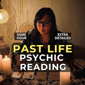 May include: An image of a person wearing glasses, conducting a past life psychic reading. The text on the image reads "PAST LIFE PSYCHIC READING" with the words "SAME HOUR" and "EXTRA DETAILED" in the corners. Tarot cards and candles are on the table.