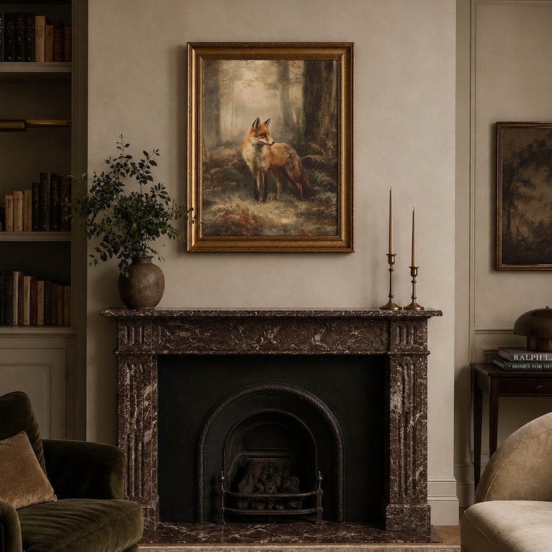 May include: A framed oil painting of a red fox standing in a misty forest, displayed above a dark brown marble fireplace. The artwork features muted earth tones, including shades of brown, green, and orange, encased in a gold frame.