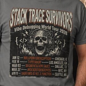May include: A grey short-sleeved t-shirt featuring a graphic print with the text "STACK TRACE SURVIVORS" and "Vibe Debugging World Tour 2026" above a skull illustration, with a list of tour dates and locations printed below the skull graphic.