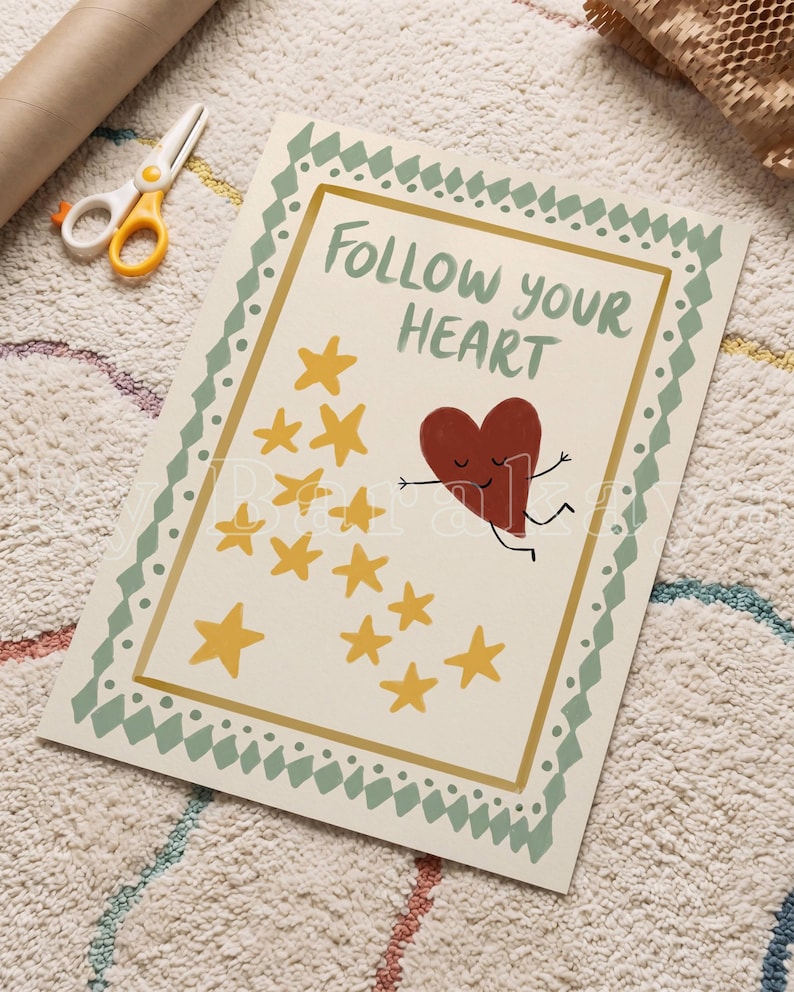 May include: A rectangular print on a cream background featuring the text FOLLOW YOUR HEART in green. A dark red heart character with a face and limbs is depicted next to a cluster of yellow stars. The print has a green geometric border.