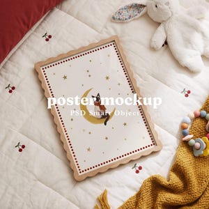 May include: A rectangular wooden frame with a scalloped edge containing a poster that features a cat sitting on a yellow crescent moon surrounded by gold stars and a red dotted border. The text poster mockup PSD Smart Object is visible.