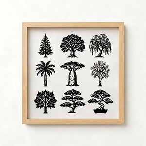 May include: A square wooden frame containing a white fabric piece with a black cross-stitch pattern. The design features a grid of nine distinct tree silhouettes, including a pine, palm, baobab, and two bonsai trees, rendered in a pixelated style.