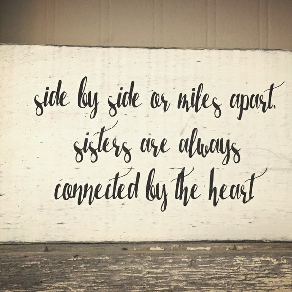 Side by side or miles apart, sisters are always connected by the heart sign - sister gift
