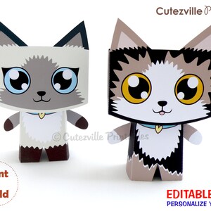 May include: Printable papercraft model of two cute cartoon cats. One cat is white with brown markings and blue eyes, the other is black and brown with yellow eyes. Both cats have a blue collar with a heart charm. The text "Cutezville Printables" is at the top of the image. The text "Print & Build" is at the bottom left of the image. The text "EDITABLE TEXT PERSONALIZE YOURSELF!" is at the bottom right of the image.