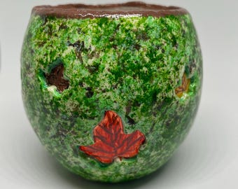 Whimsical clay/glass T-Light holder with quirky little windows
