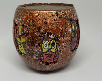 Whimsical clay/glass T-Light holder with quirky little windows