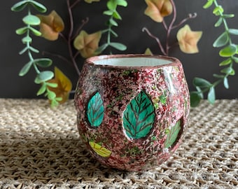 Whimsical clay/glass T-Light holder with quirky little windows