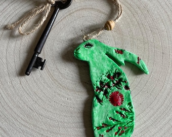 Whimsical secret garden handle hare