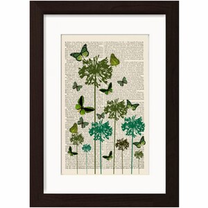May include: A vintage book page with a green and black butterfly design. The butterflies are flying around green plants with a white background. The text on the page is in French.
