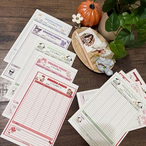 May include: A collection of paper sinking funds trackers featuring colorful borders and cartoon character illustrations. Each sheet includes columns for month, start balance, added, minus, and end balance, with a total and notes section at the bottom.
