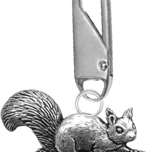 May include: A silver-colored keychain featuring a detailed squirrel perched on a branch. The squirrel has a bushy tail and is attached to a metal clasp. The keychain is designed with intricate details and a realistic appearance.