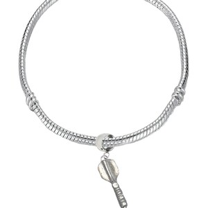 May include: A silver-colored charm bracelet with a dart-shaped pendant. The bracelet has a snake chain design with a barrel clasp. The dart charm is detailed with a feathered tail and a pointed tip.