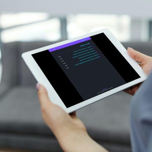 May include: A white tablet displaying a dark interface with a purple header bar. The screen shows a list of text items with bullet points, including the phrase "connected to what?" at the top, followed by several lines of small, dark-colored text.