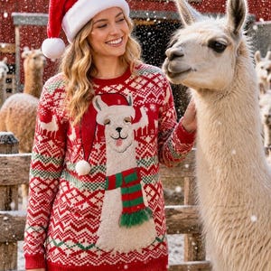May include: A red and white long-sleeve knit sweater featuring a large central graphic of a llama wearing a Santa hat and a green and red striped scarf. The sweater has a repeating geometric pattern in red, white, and green across the fabric.