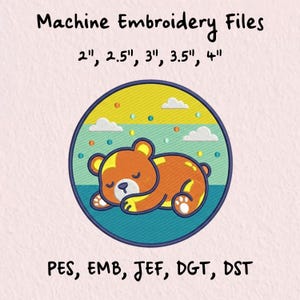May include: Machine Embroidery Files featuring a sleeping bear design. The image includes sizes 2", 2.5", 3", 3.5", and 4". The design is a cartoon bear in orange and yellow, set against a blue and yellow background. File formats include PES, EMB, JEF, DGT, and DST.