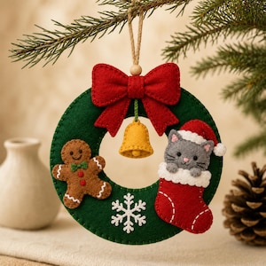 May include: A circular dark green felt wreath ornament featuring a large red felt bow at the top, a yellow felt bell, a brown gingerbread man, a white felt snowflake, and a grey cat wearing a Santa hat inside a red felt Christmas stocking.