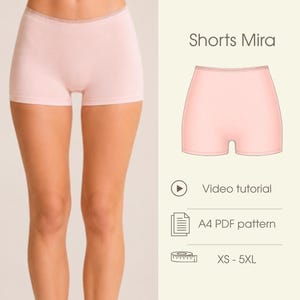 May include: Light pink shorts with a fitted silhouette and a subtle waistband detail. The image includes the text OLI.PATTERN, Shorts Mira, Video tutorial, A4 PDF pattern, and XS - 5XL, indicating a sewing pattern for these specific shorts.