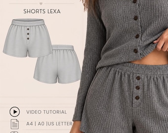 Könnte beinhalten: Ein PDF-Schnittmuster und Video-Tutorial für die Lexa-Shorts von Oli Pattern. Das Bild zeigt ein graues, geripptes Langarm-Oberteil mit Knöpfen und dazu passende graue, gerippte Shorts mit einer Knopfleiste mit drei Knöpfen, Größen XS bis 5XL.