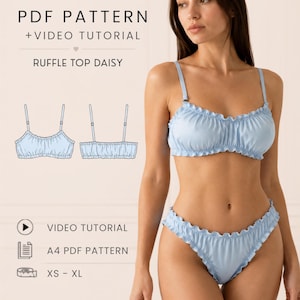 May include: A light blue ruffle top and matching bottom set with thin adjustable straps. The text reads PDF PATTERN + VIDEO TUTORIAL, RUFFLE TOP DAISY, VIDEO TUTORIAL, A4 PDF PATTERN, XS - XL, and OLI PATTERN. Includes a technical line drawing.